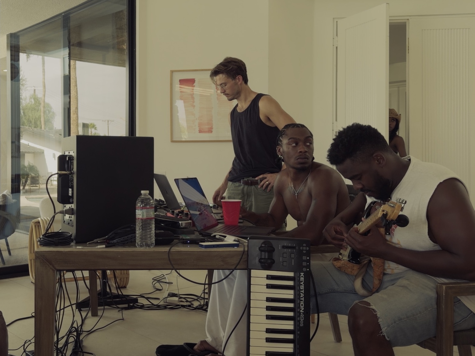 musicians working together during a studio session
