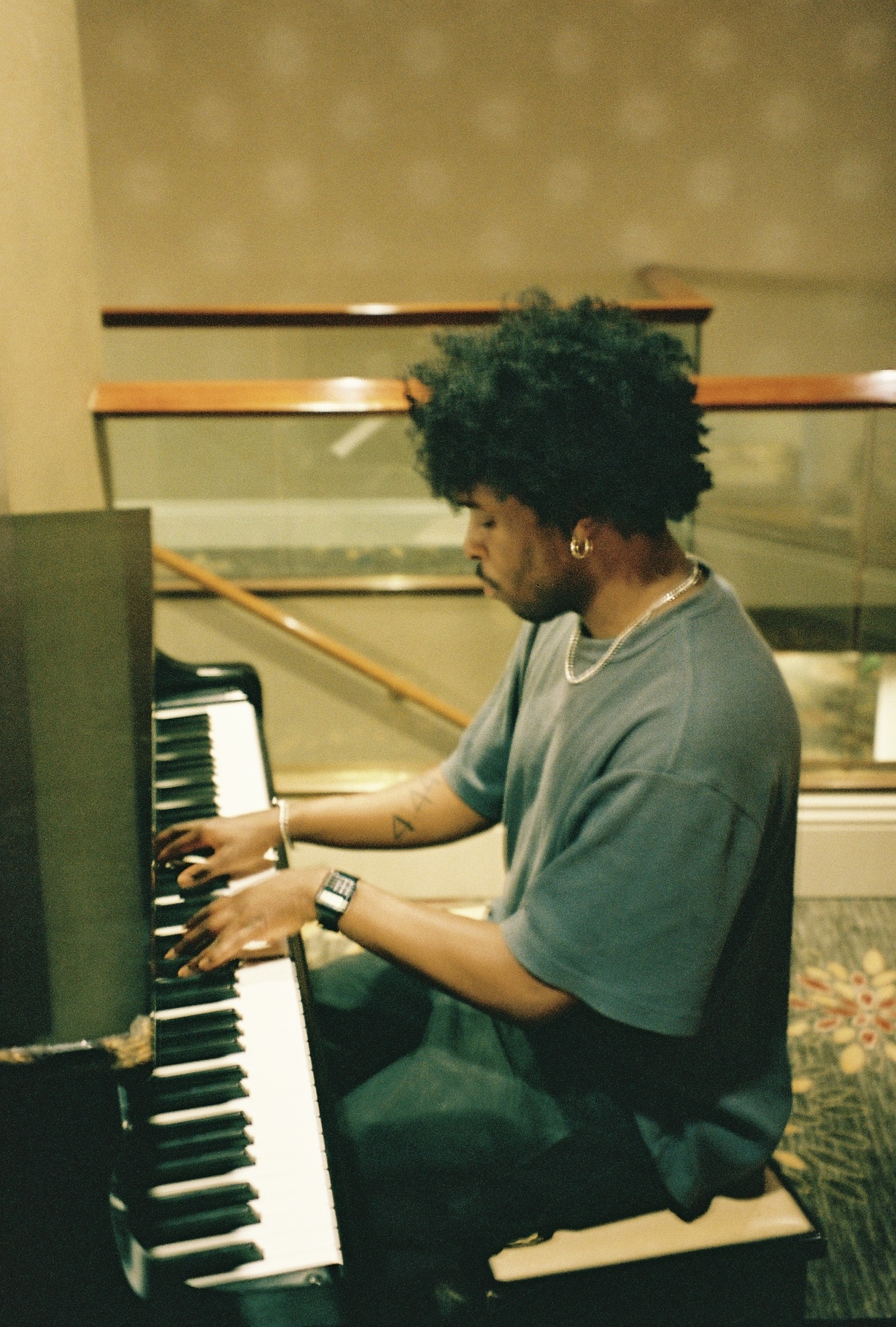Film photograph of a musician at a piano